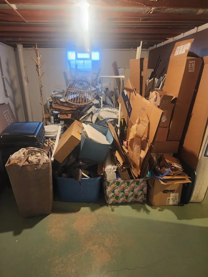 Roll-off dumpster container at job site for Roll Off Dumpster Rental in Buckley